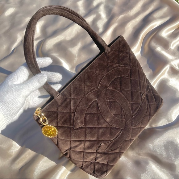 Chanel chocolate brown velvet medallion vintage handbag.